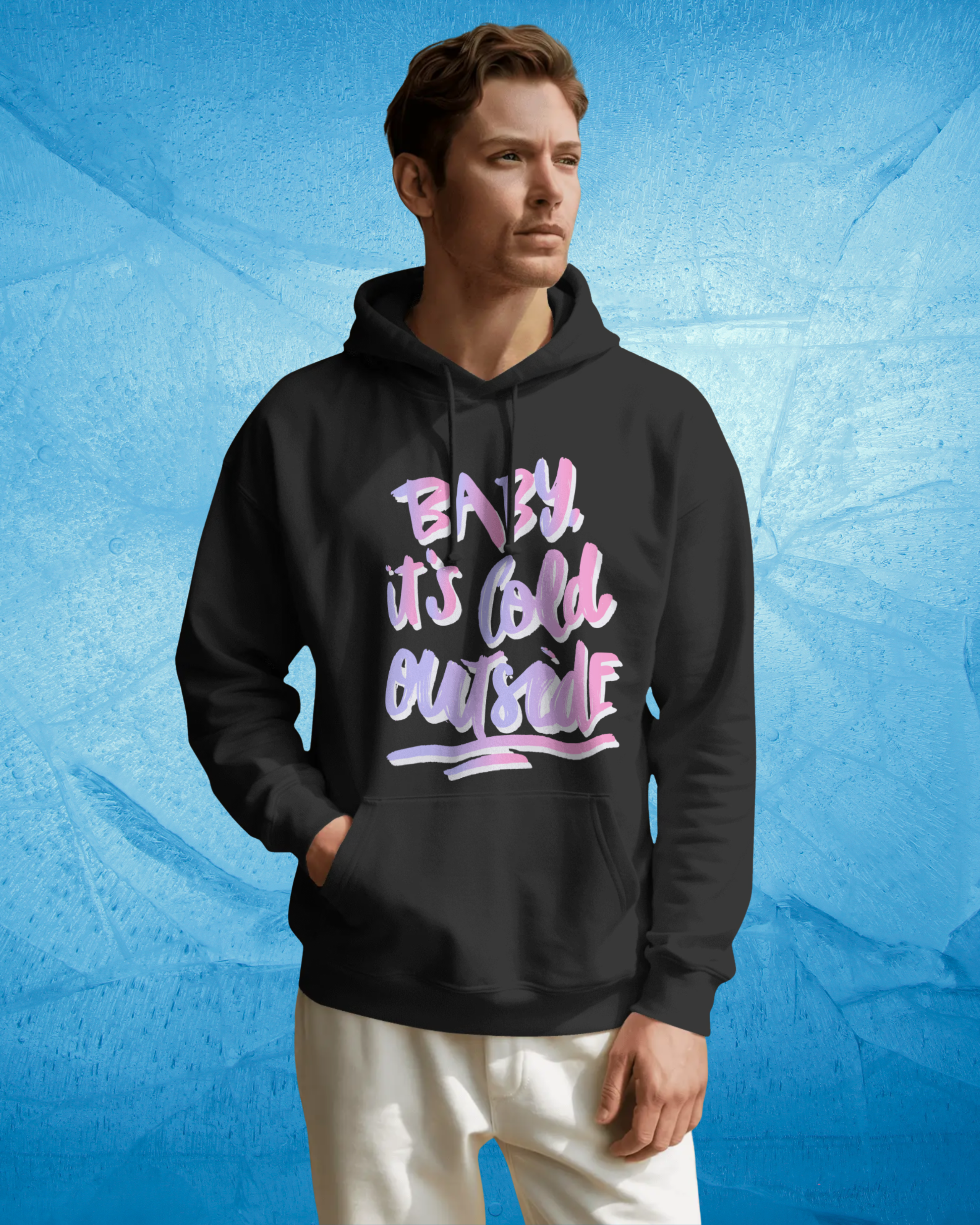 Person wearing a black hoodie with colorful text on a blue textured background