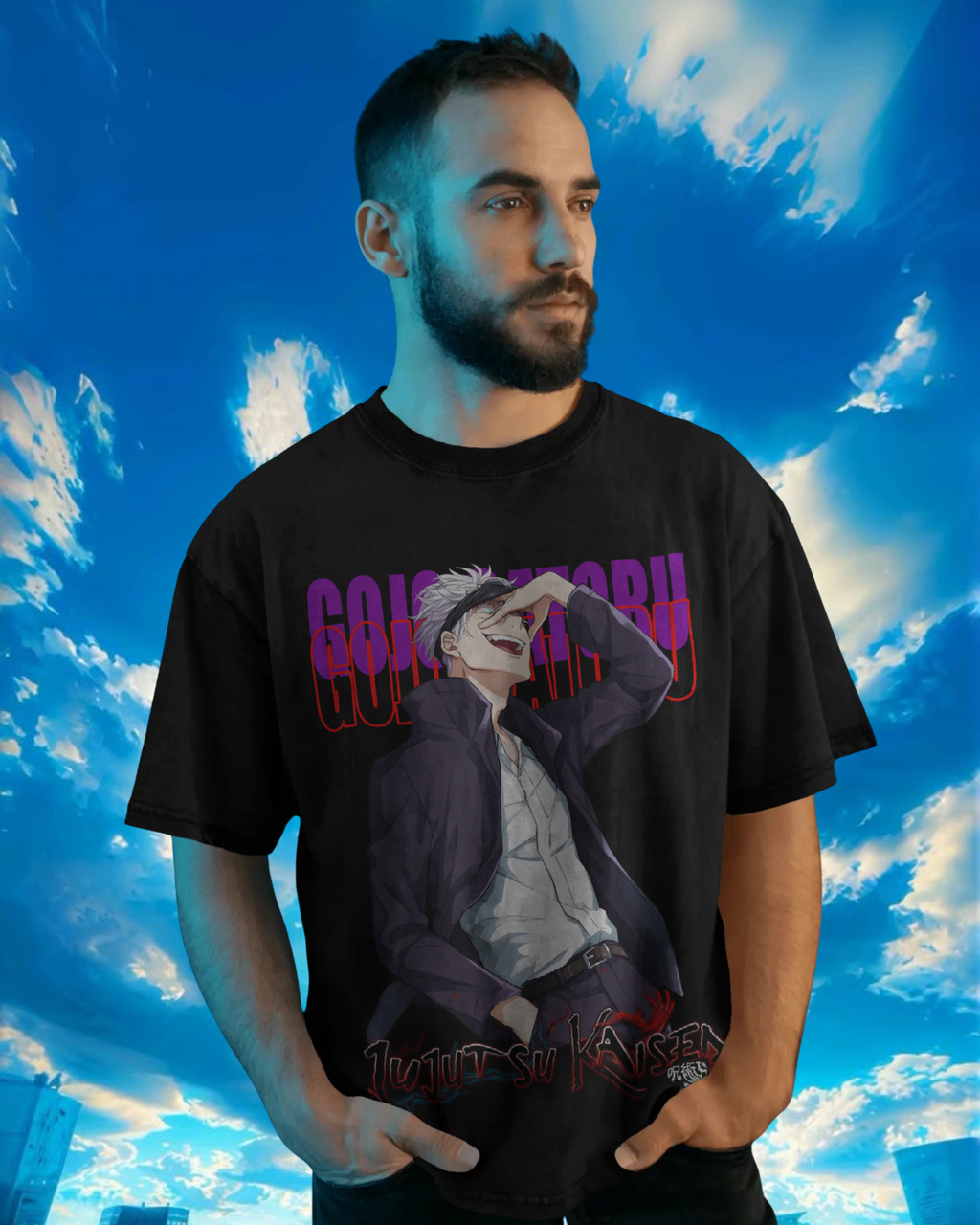 Person wearing a black t-shirt with a graphic design against a blue sky background