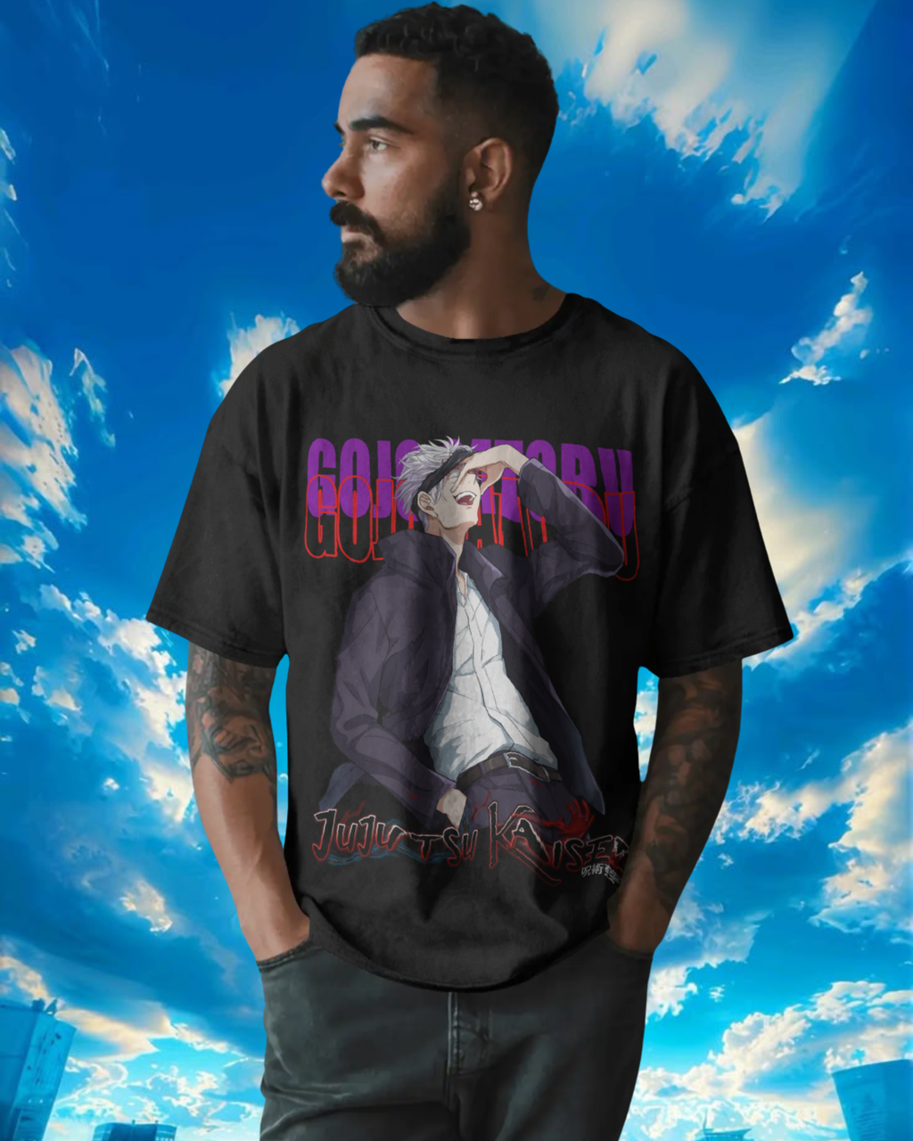 Man wearing a black t-shirt with a graphic design against a blue sky background