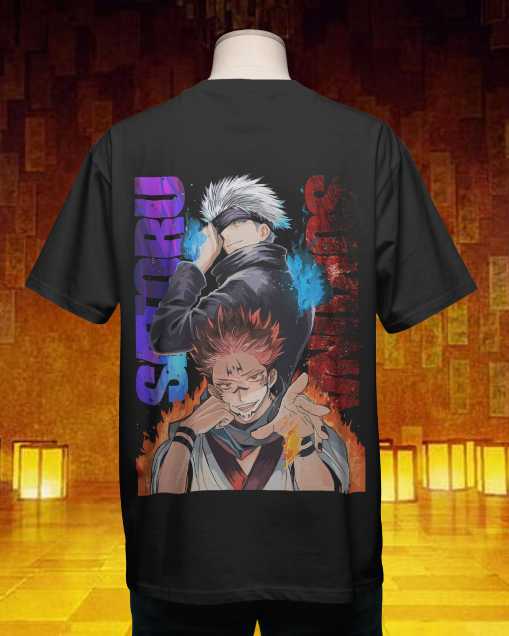 Black t-shirt with anime character design on the back, displayed against a warm-toned background