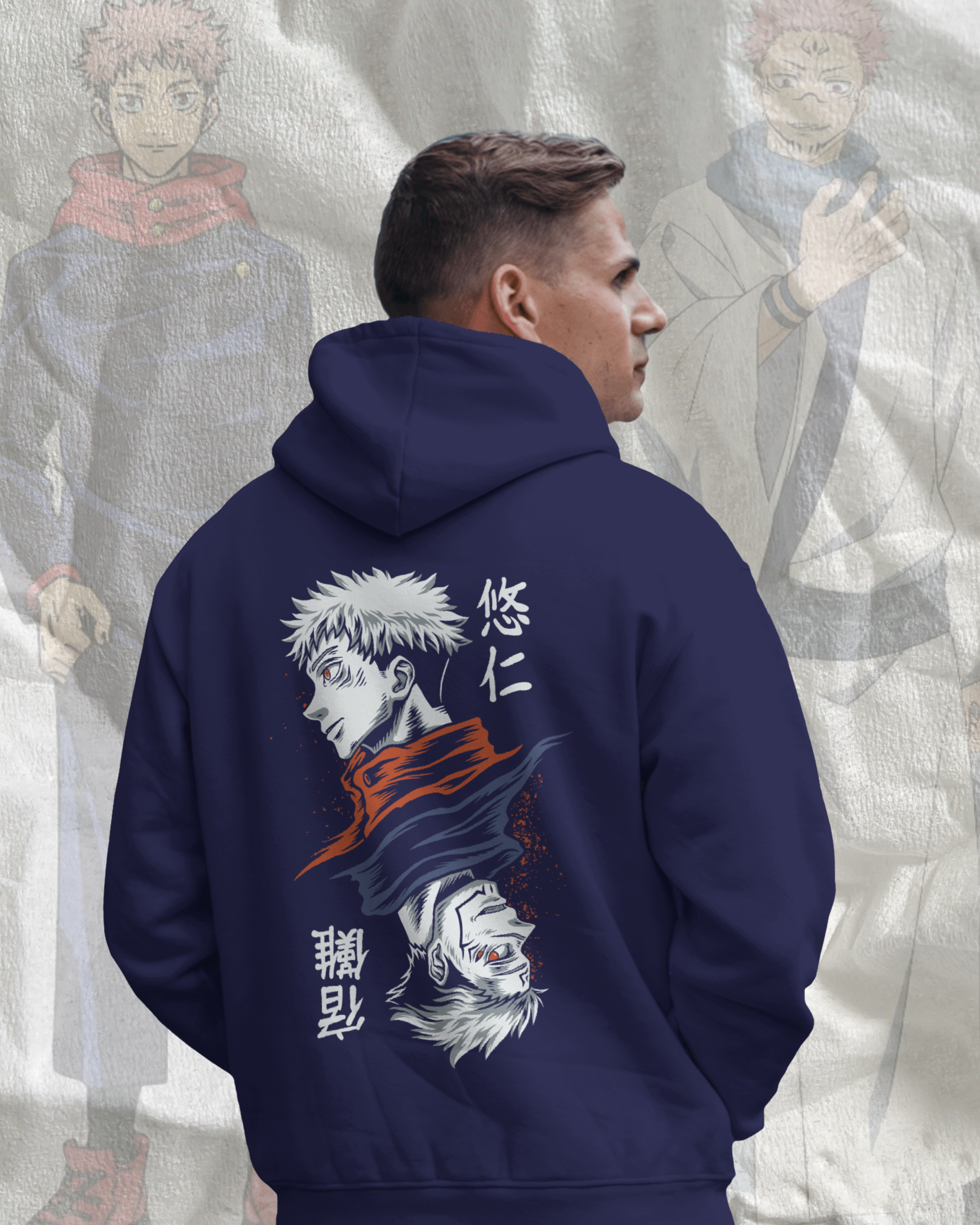 Person wearing a navy blue hoodie with anime character design on the back, standing in front of an anime-style background