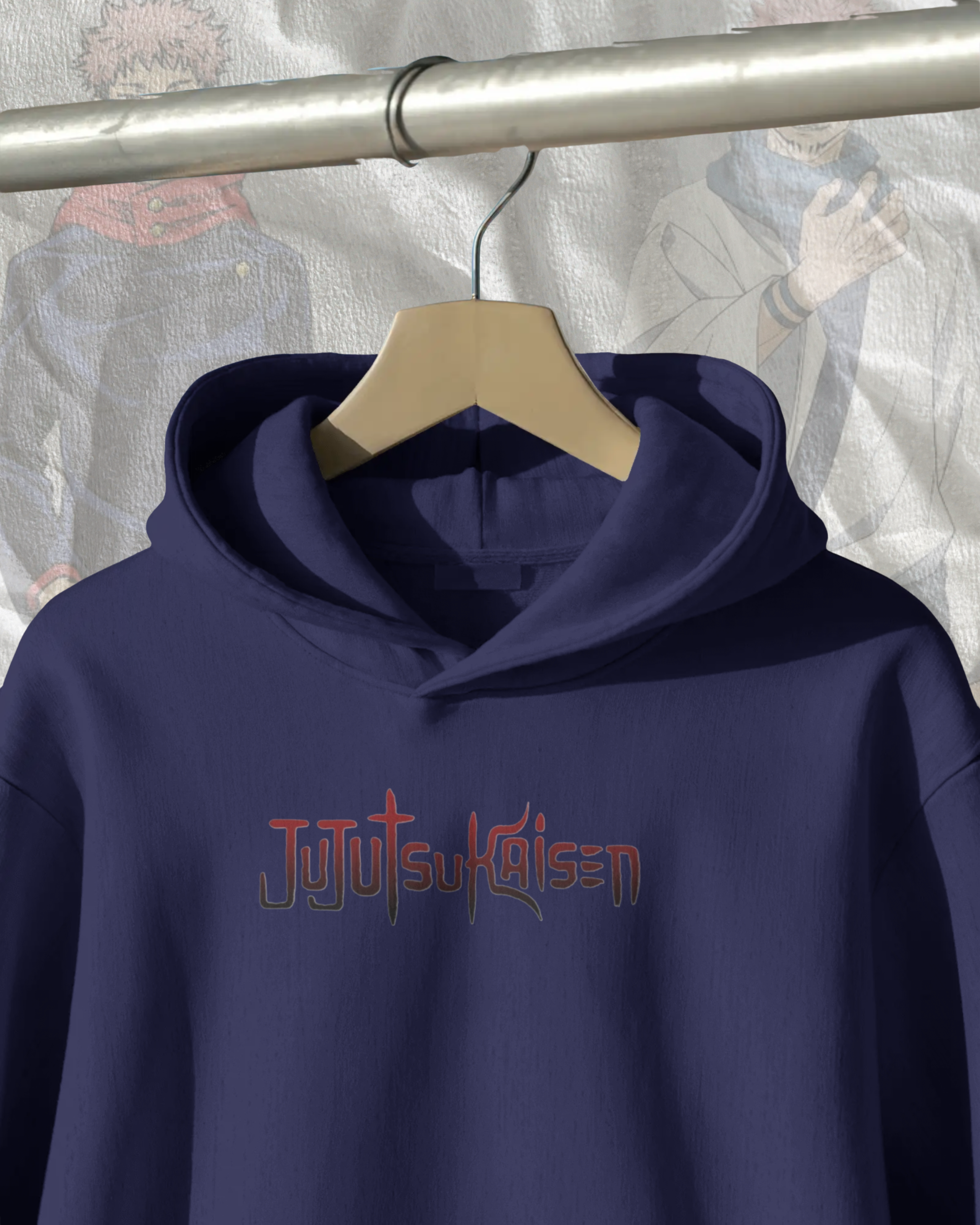 Navy blue hoodie with 'Jujutsu Kaisen' text on a hanger against a patterned background